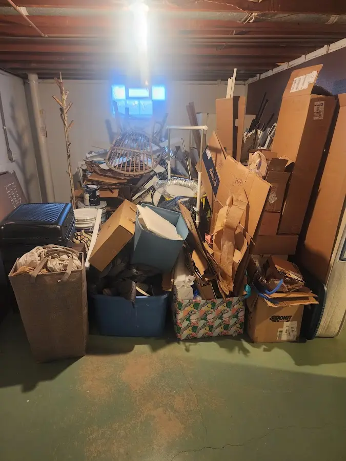 Roll-off dumpster container at job site for Yard Waste Dumpster Rental in Natchez